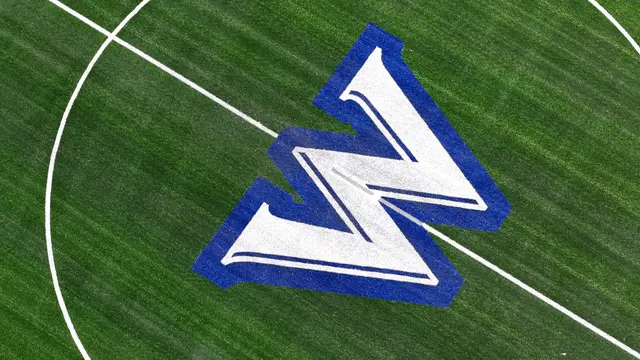 White and blue W midfield logo on Wilson College’s synthetic turf