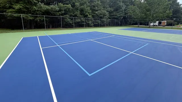 New acrylic court surface with tennis and blended pickleball lines