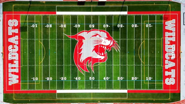 Overhead view of the stadium field with Wildcat midfield logo and WILDCATS endzones