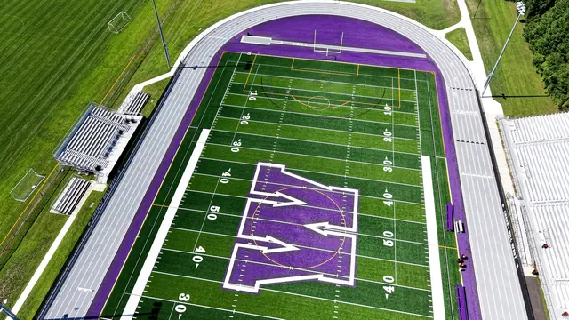 View along Cherry Hill West’s turf field and running track toward the goal posts