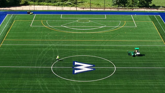 Midfield logo and sports lines at Kris’s Meadow turf field