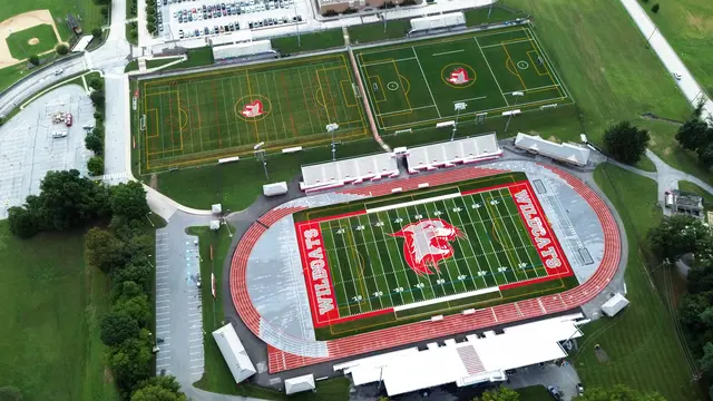 Aerial overview of the stadium track, turf field and two auxiliary fields