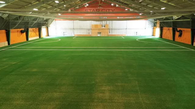 Central view of the indoor soccer field and goal area