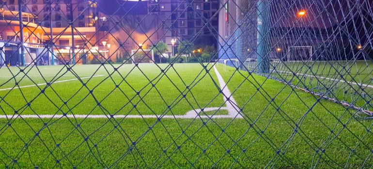 installing artificial turf and sports netting