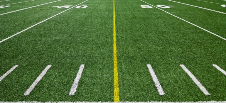 How Can High School Sports Programs Benefit From Synthetic Turf?