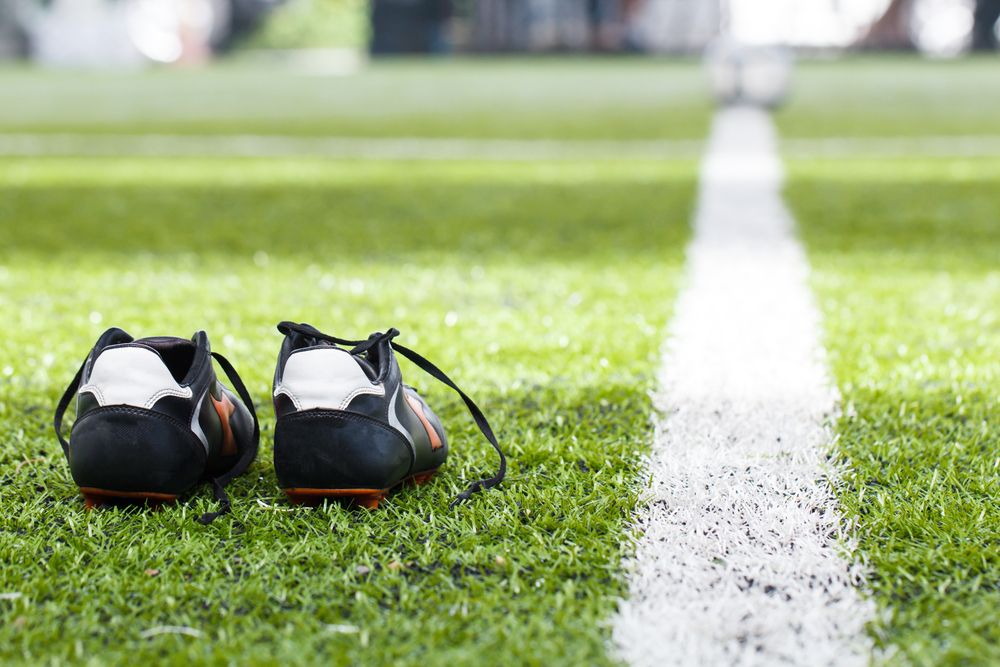 What is the Recommended Footwear for Playing On Turf Fields?