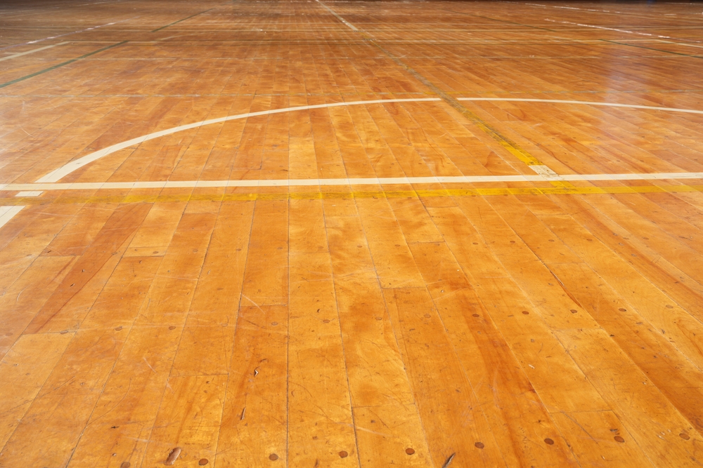 The Ultimate High-School Gym Flooring Showdown: Modular Tile vs. Traditional Hardwood