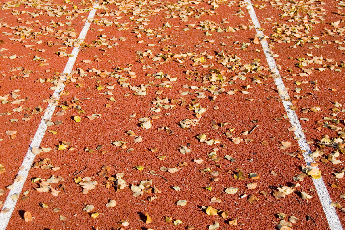 Why Fall is the Prime Season for Running Track Installation & Resurfacing